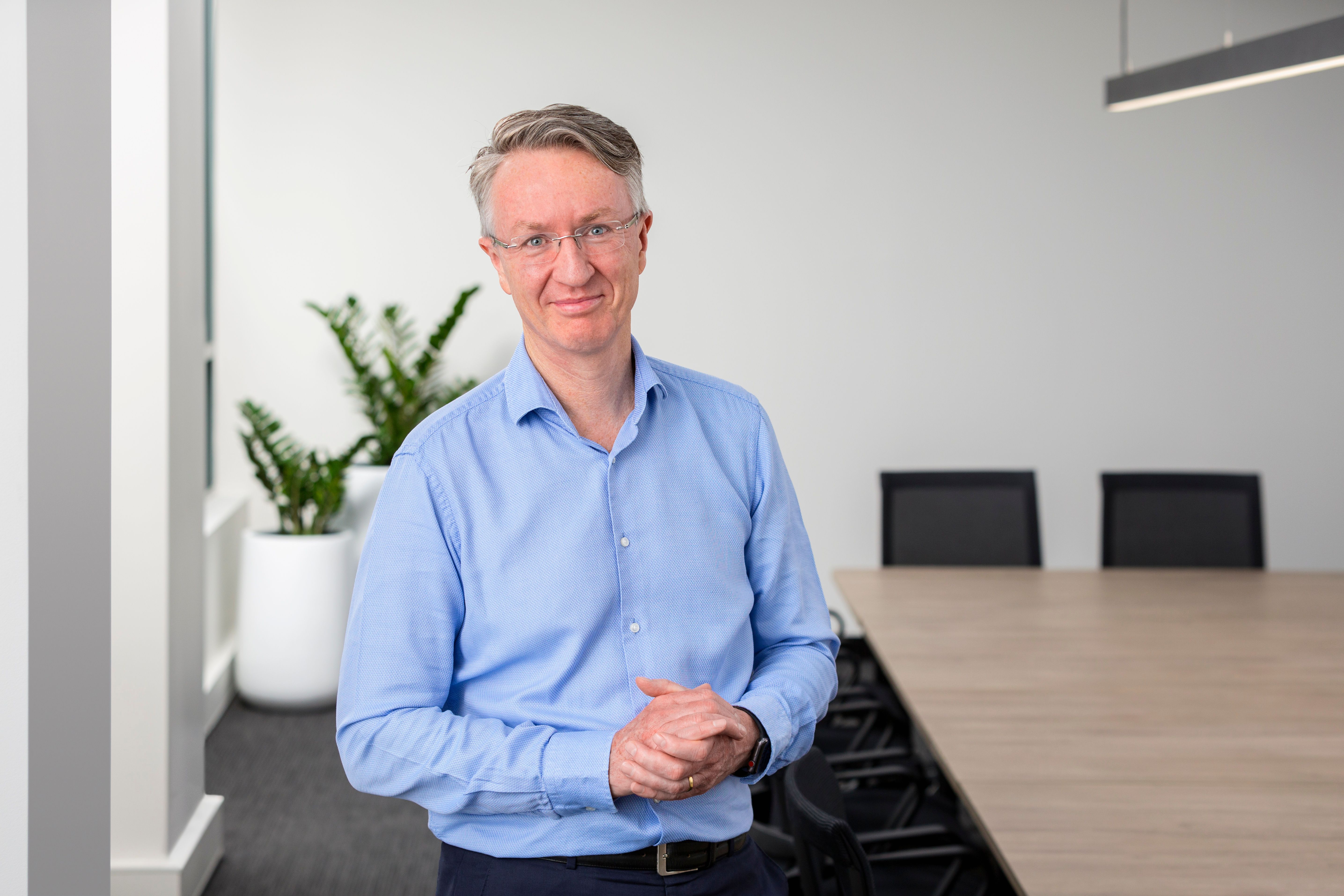 Photo of Glen Noonan in an office