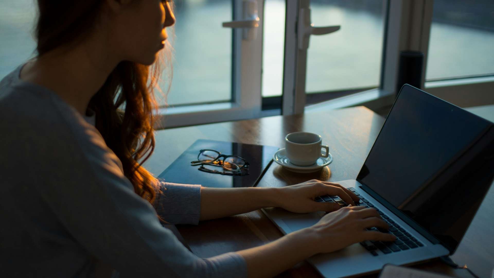 Person working on a laptop.