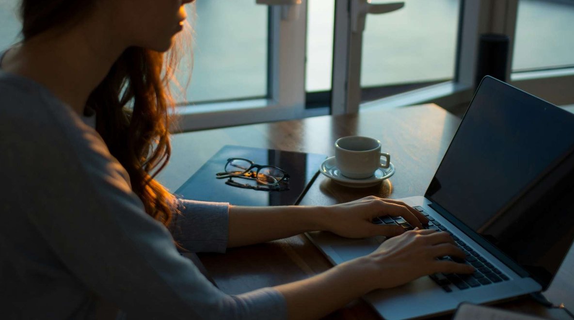 Person working on a laptop.